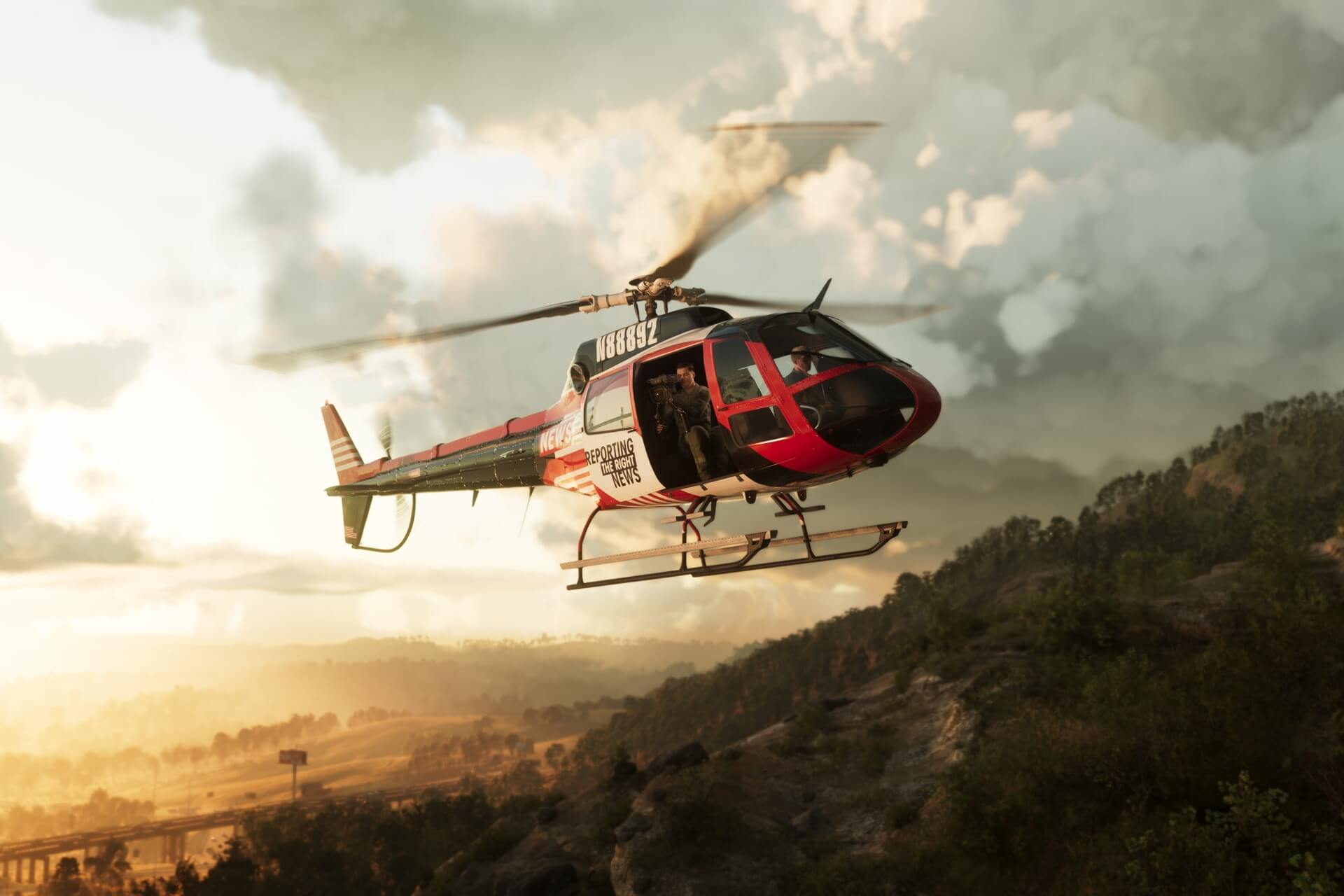 Screenshot of a helicopter flying beside a mountainside, credit Rockstar Games