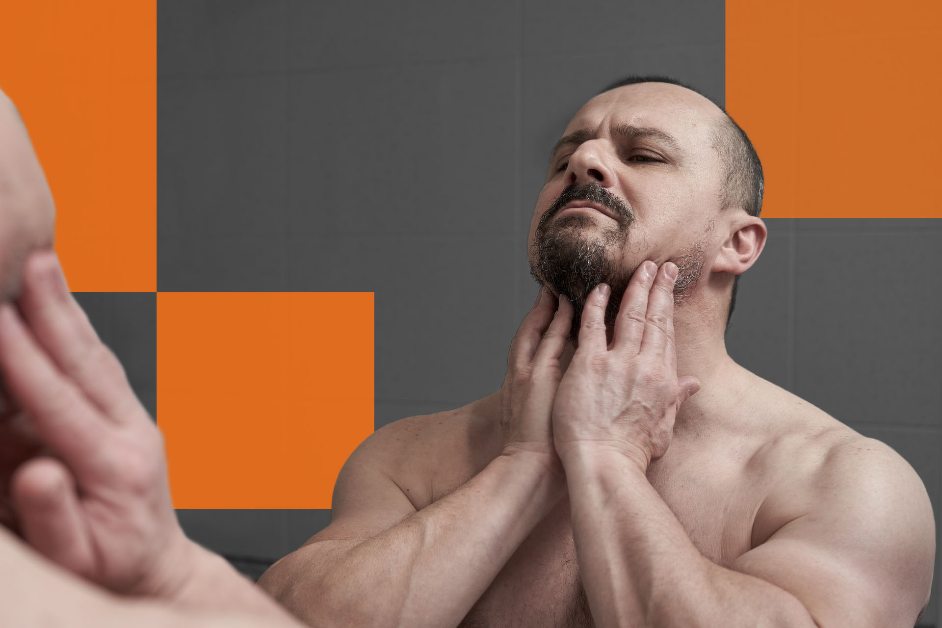 Man with a patchy beard.