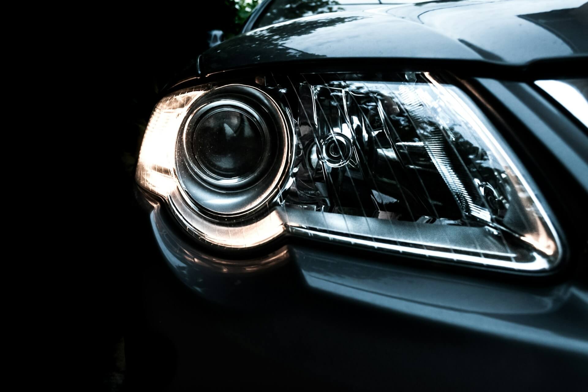 Headlight of black car
