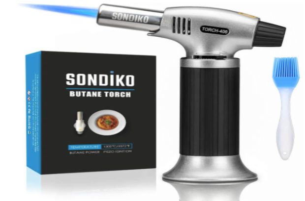 A butane torch, a cooking essential.