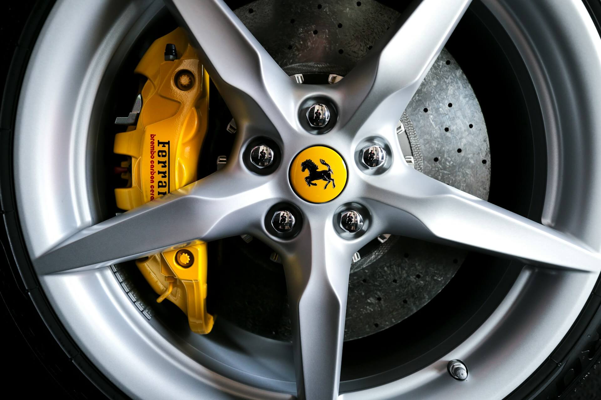 Five-spoke wheel of a Ferrari vehicle