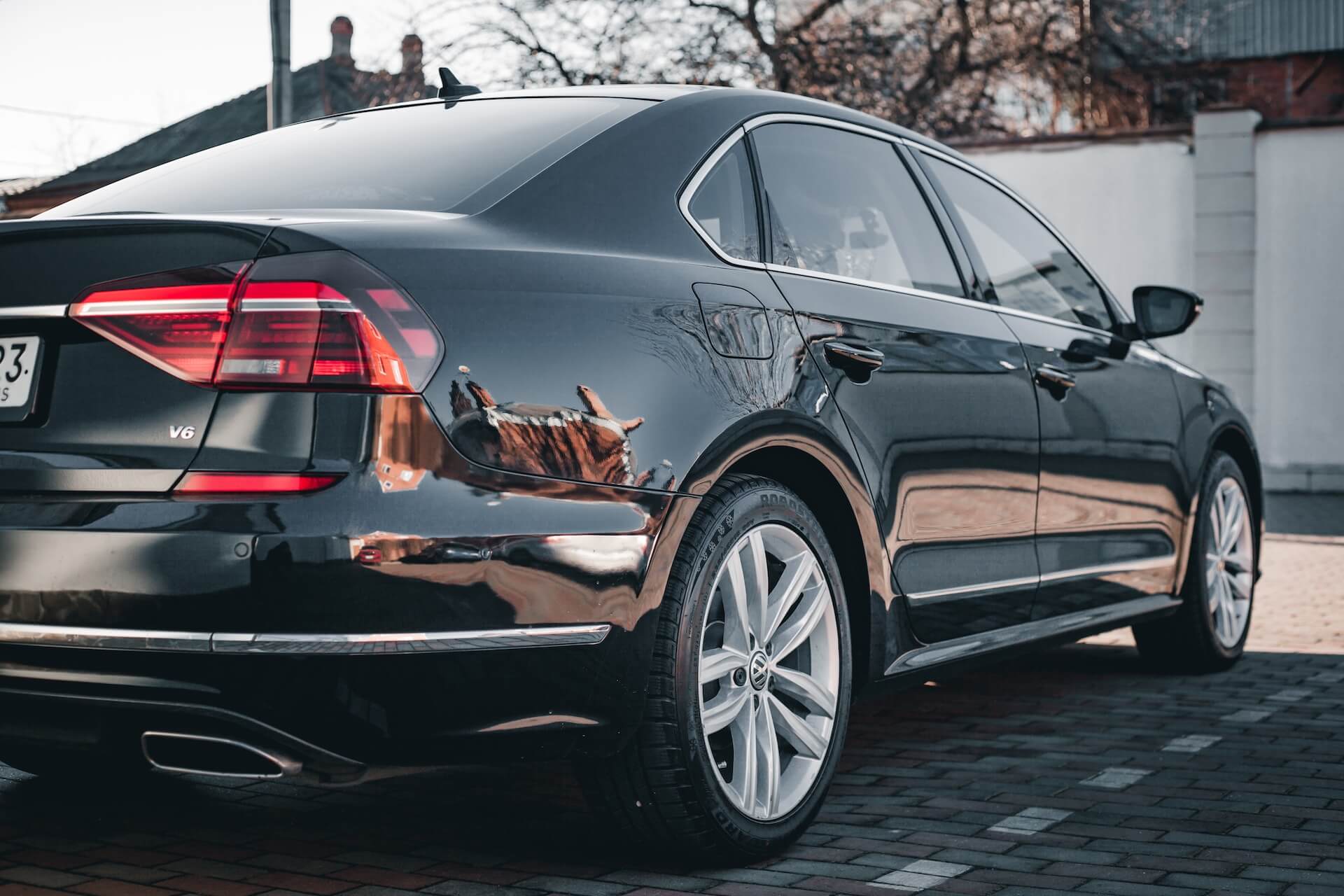 Volkswagen Passat rests on a brick road.
