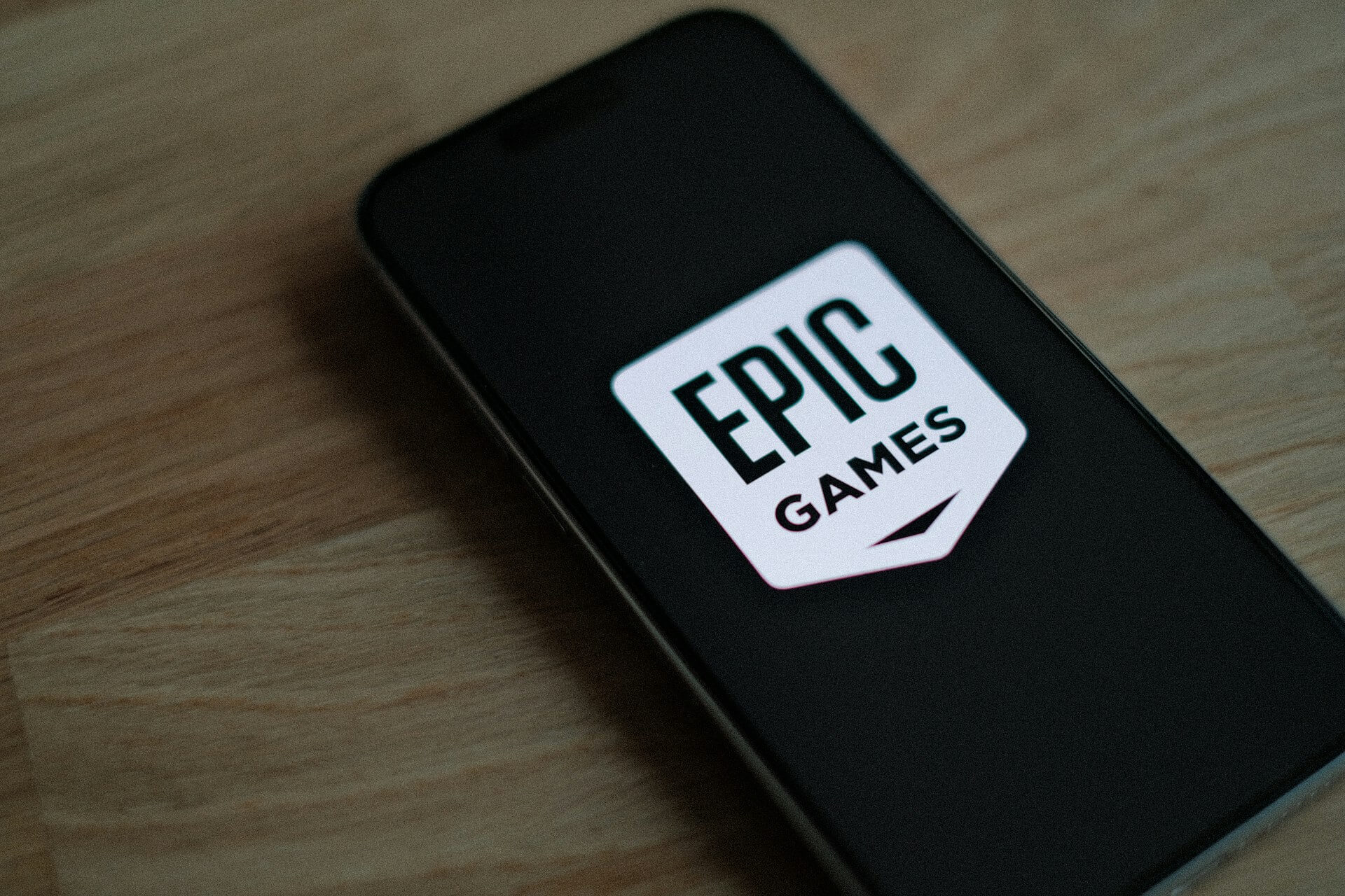 Smartphone with an Epic Gamers sticker on the back