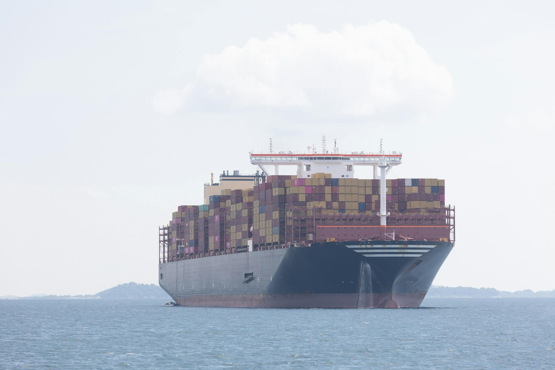 Cargo ship traveling across the ocean