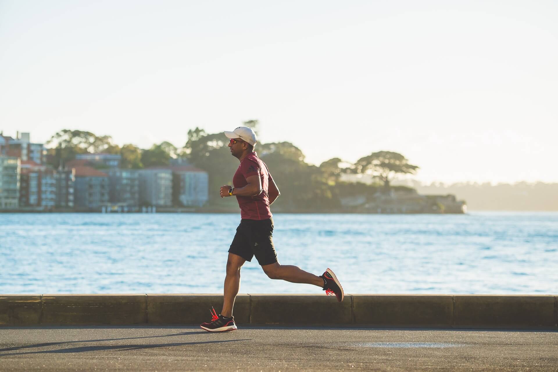 Man running along the beach