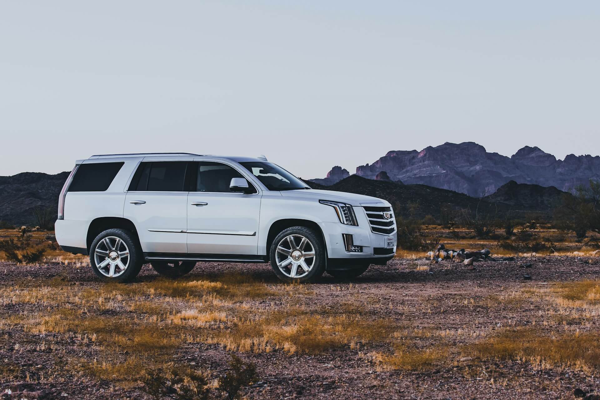 White Cadillac SUV in an Arizona desert