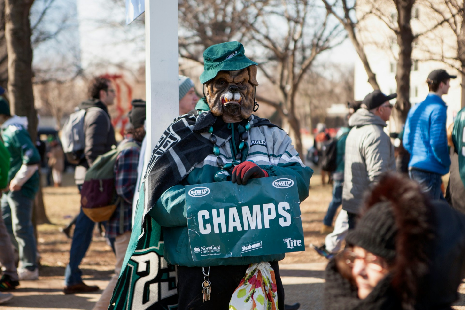 A Philadelphia Eagles fan in a dog mask celebrating their Superbowl victory