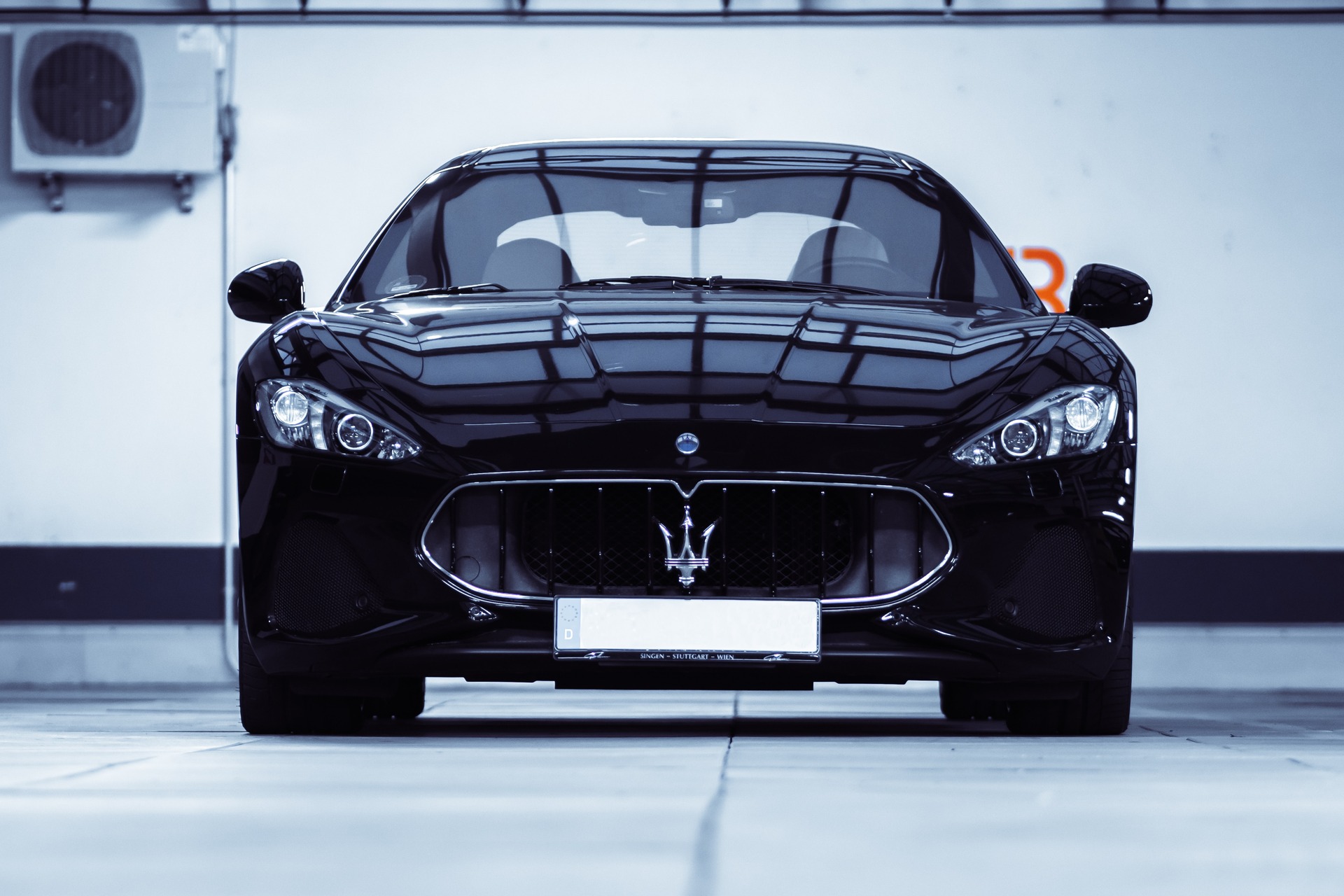 A head-on view of a black Maserati