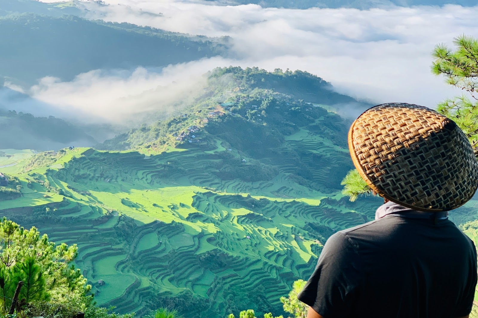 Farmer overlooking Philippines mountains