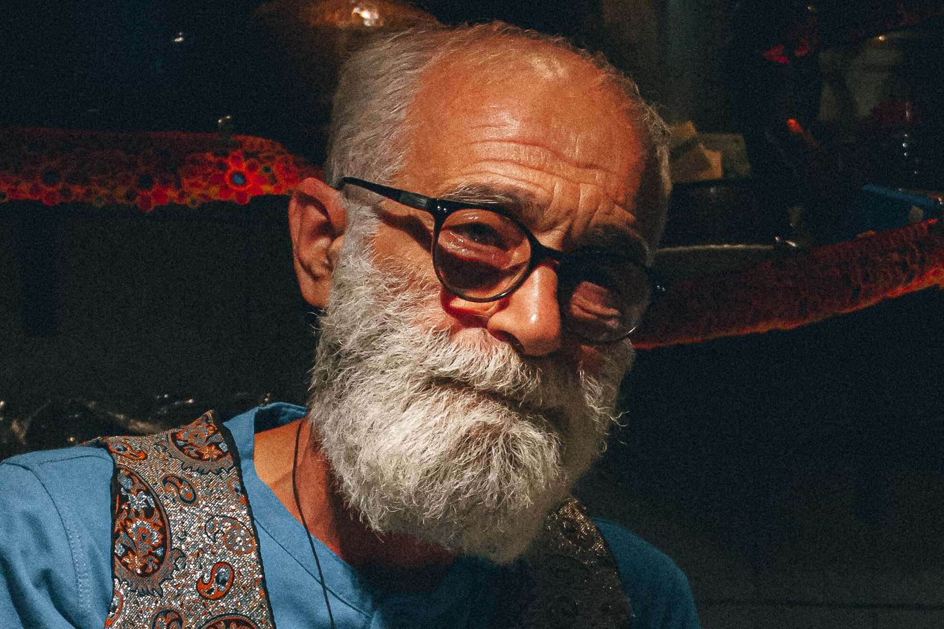 A shopkeeper with a thick Garibaldi beard