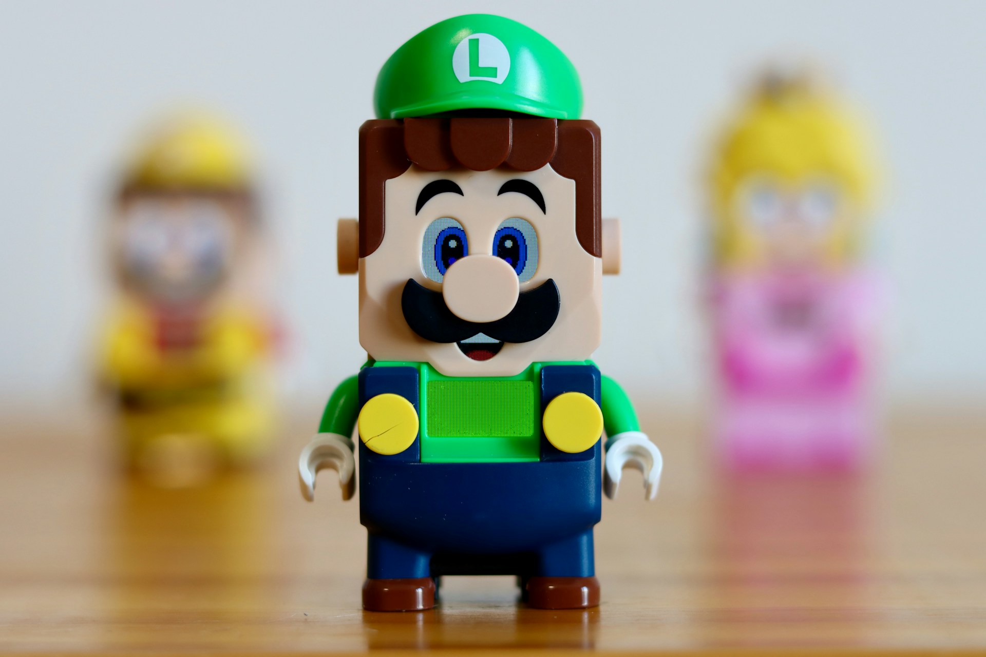 A small toy figure of Luigi