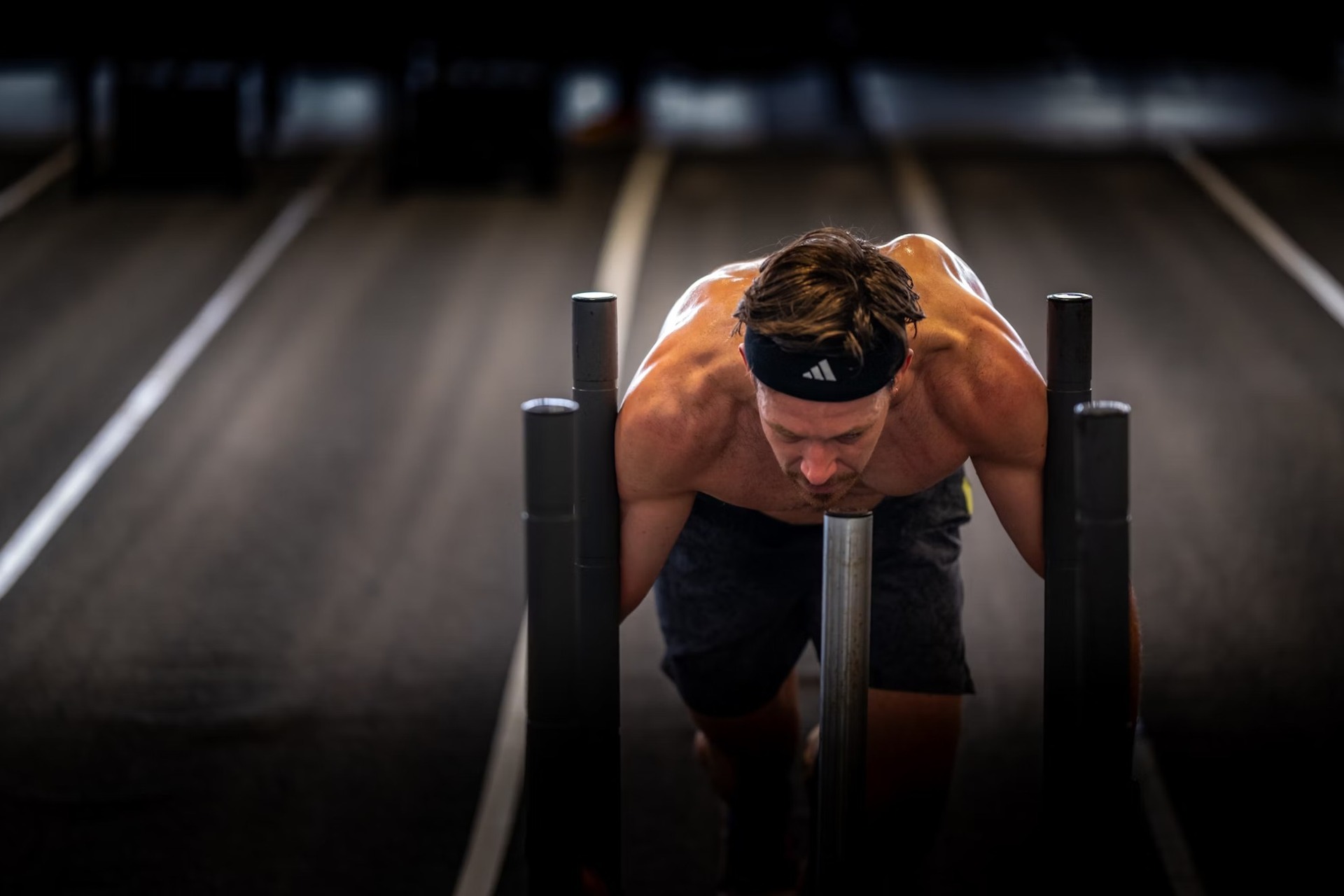 hyrox athlete pushing a weighted sled