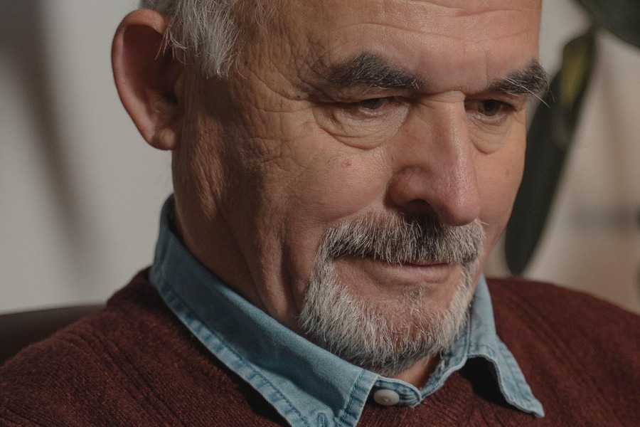A man with a well-trimmed classic goatee