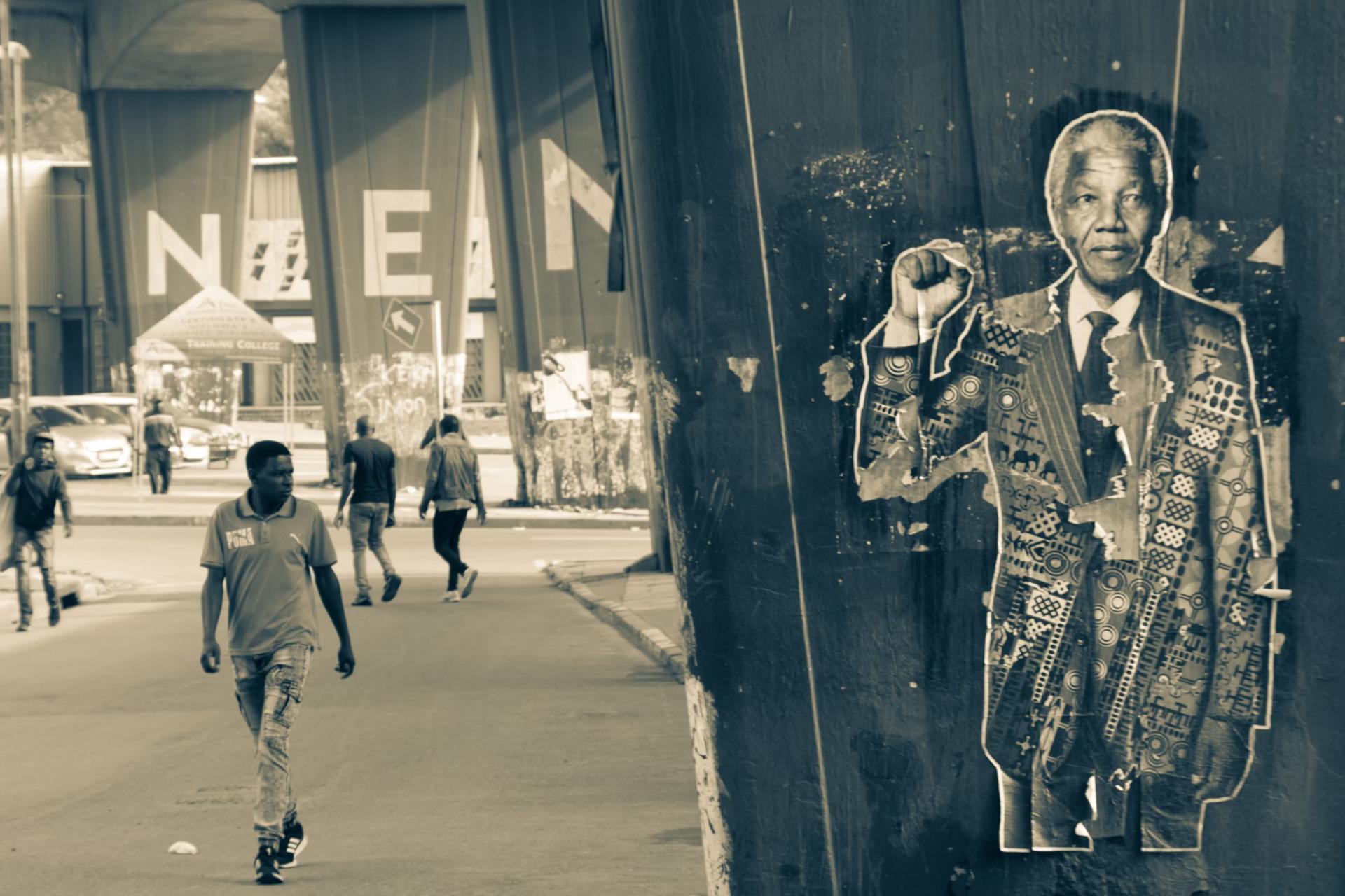 Mandela street image with bypassers
