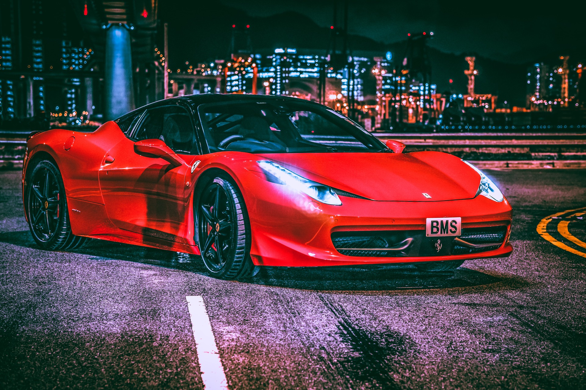 a red Ferrari in a bright city