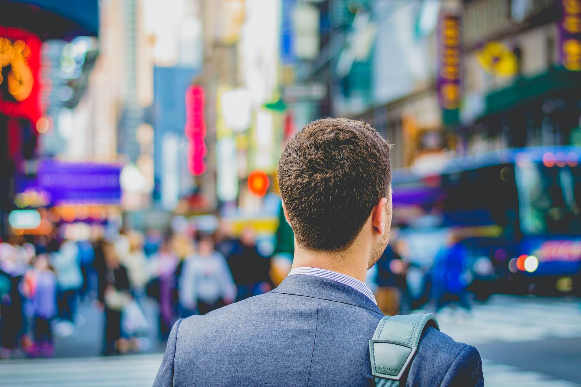 Man walking in Times Square in New York City.