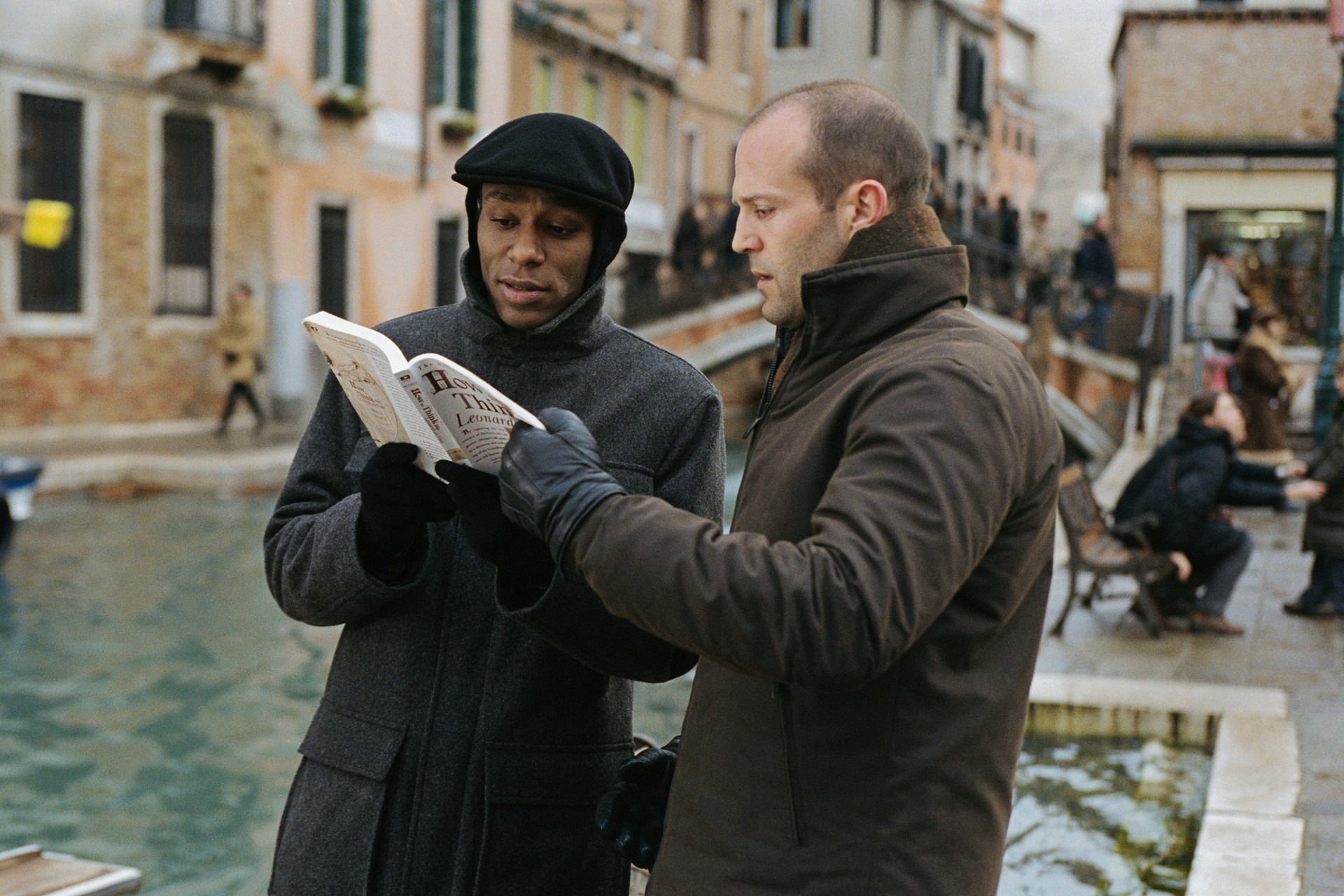 Jason Statham and Yasiin Bey read a book in The Italian Job