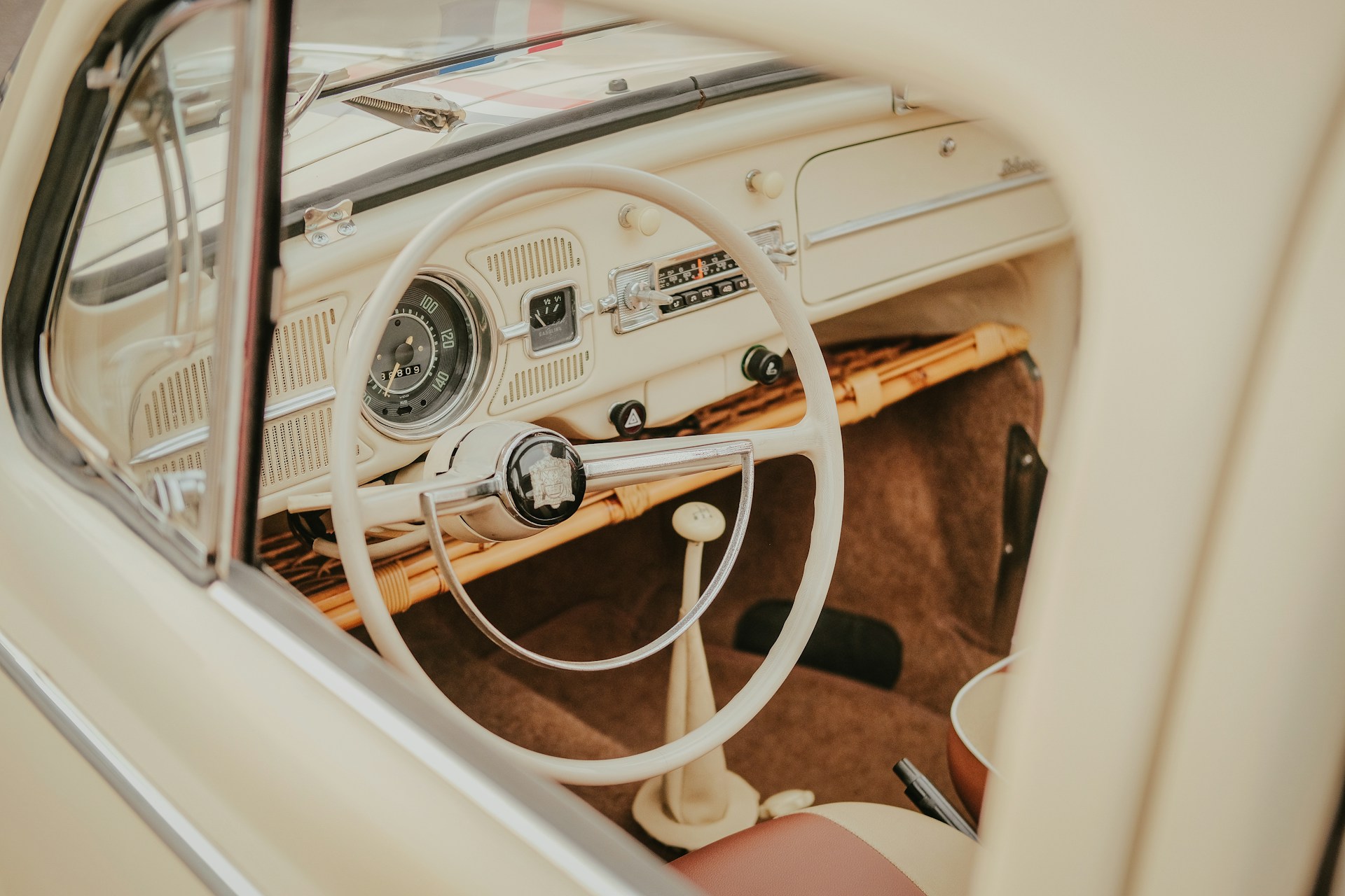 Vintage steering wheel inside a white car