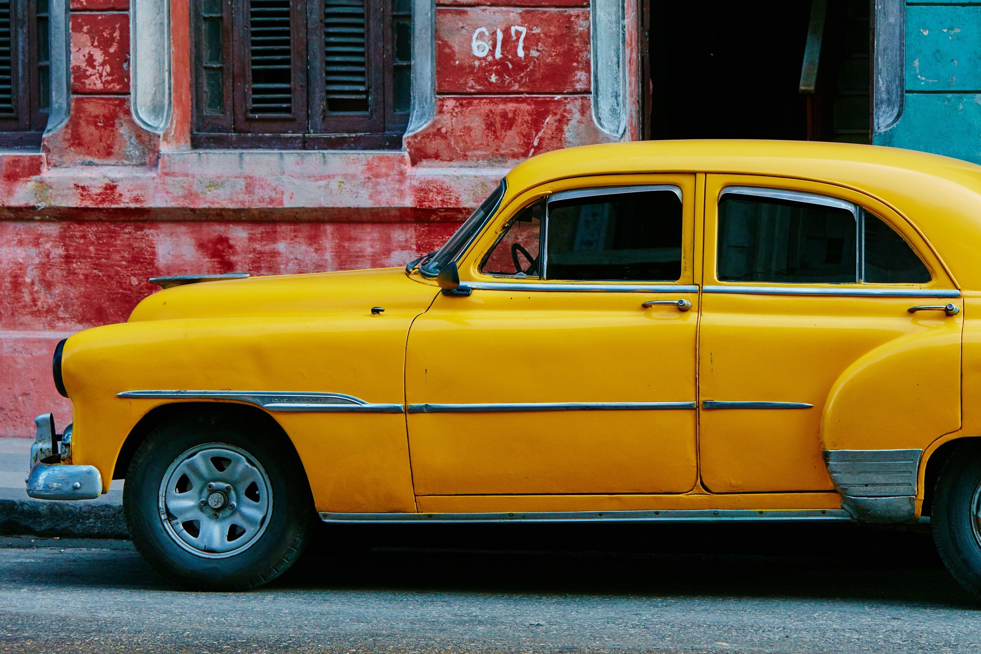 Beaten up yellow car