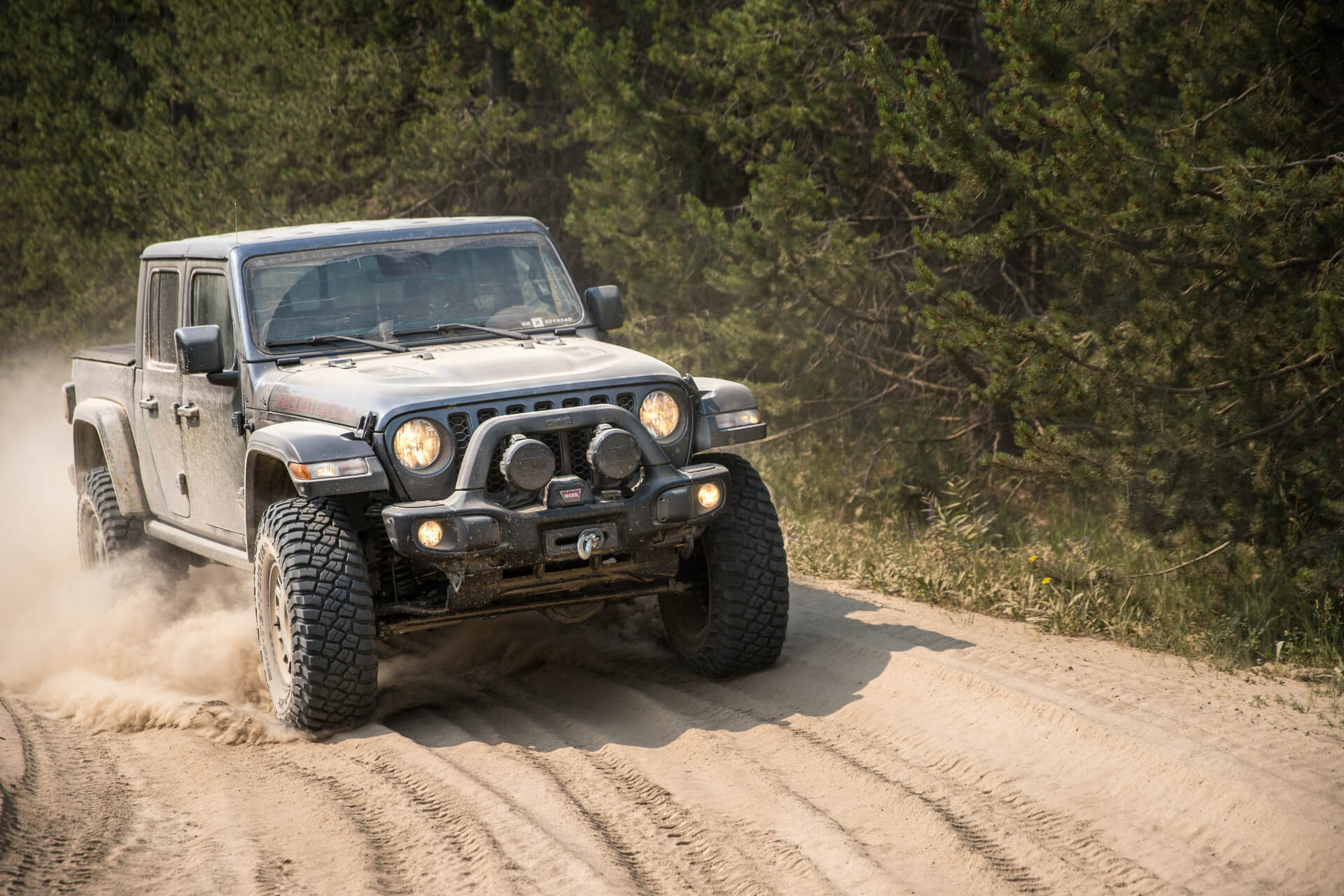 A Jeep Gladiator on a dirt road