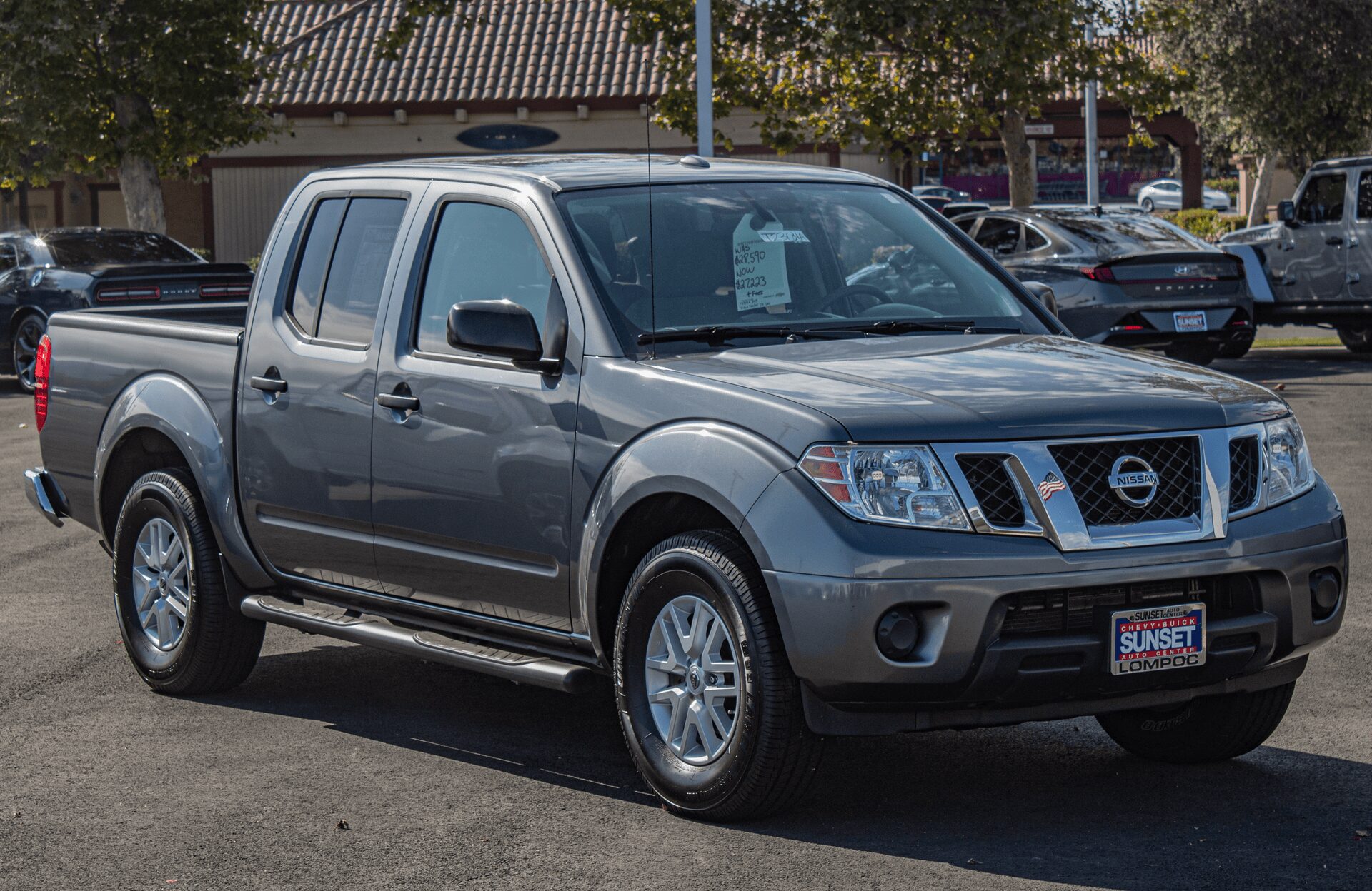 a 2018 silver Nissan Frontier