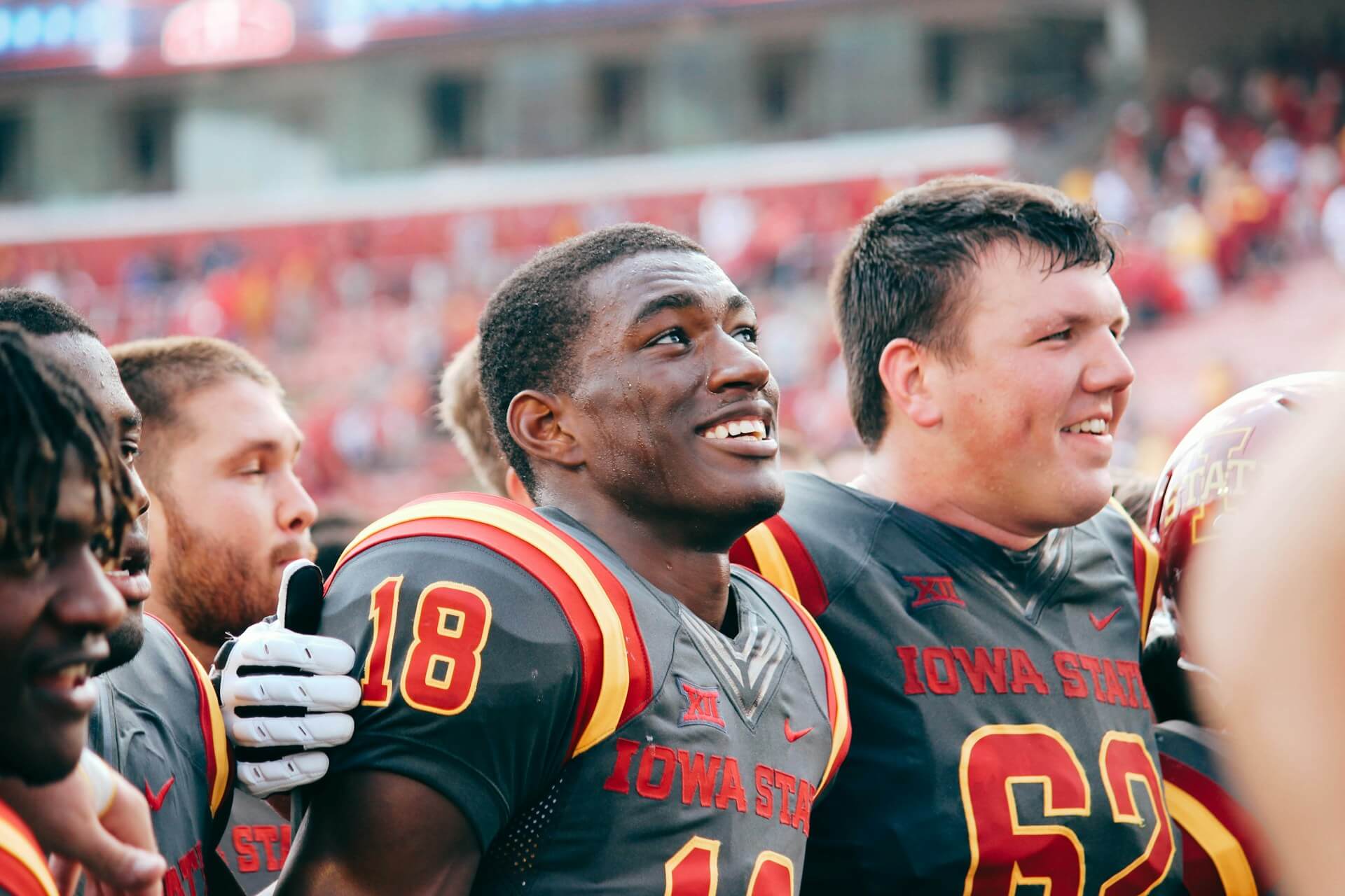Iowa State football players in their jerseys