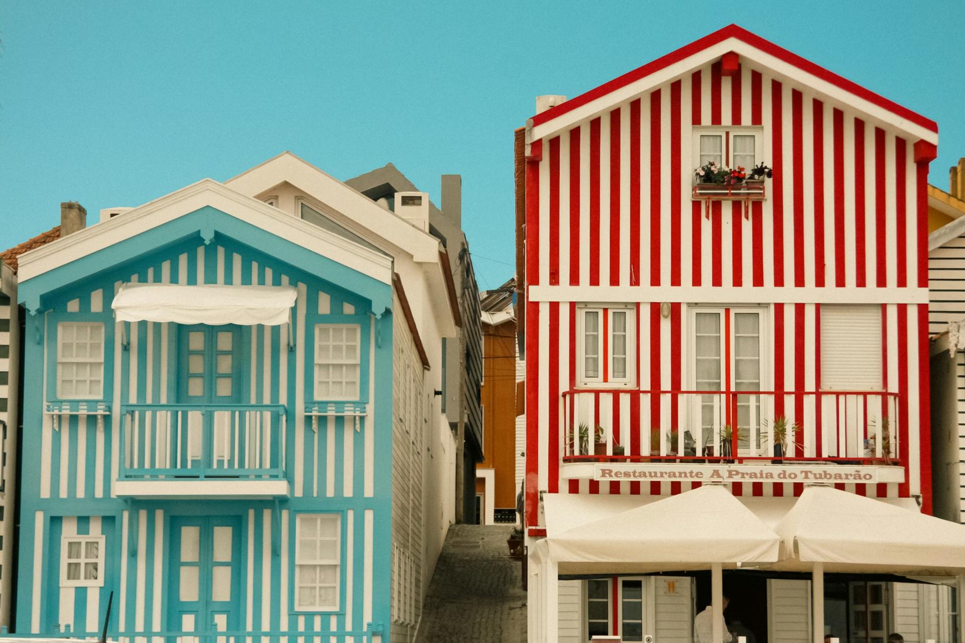 blue, red and white striped houses