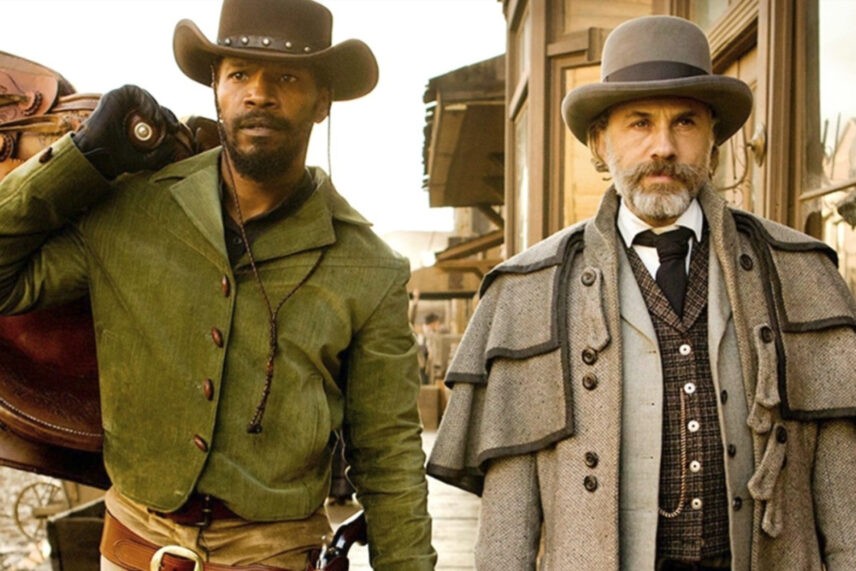 two men with hats in western clothes