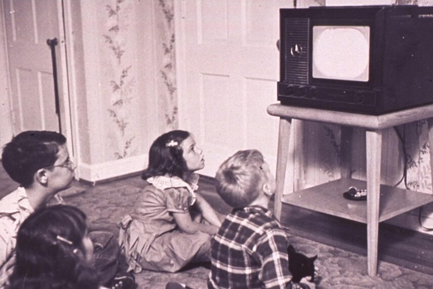 vintage children on the floor watching tv