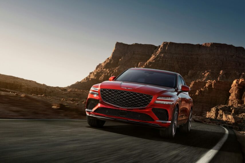 red Genesis GV80 coupe on the road