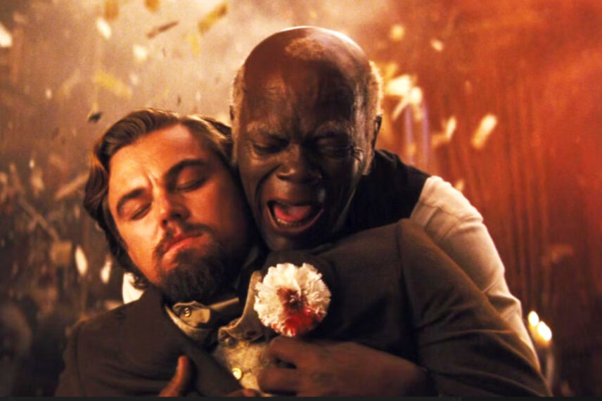 man holding another man with flower in front