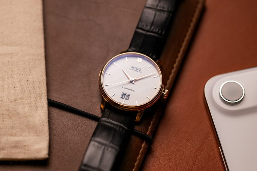 Simple watch with dark leather band