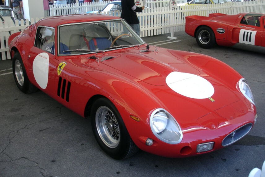 red sports car with white spots