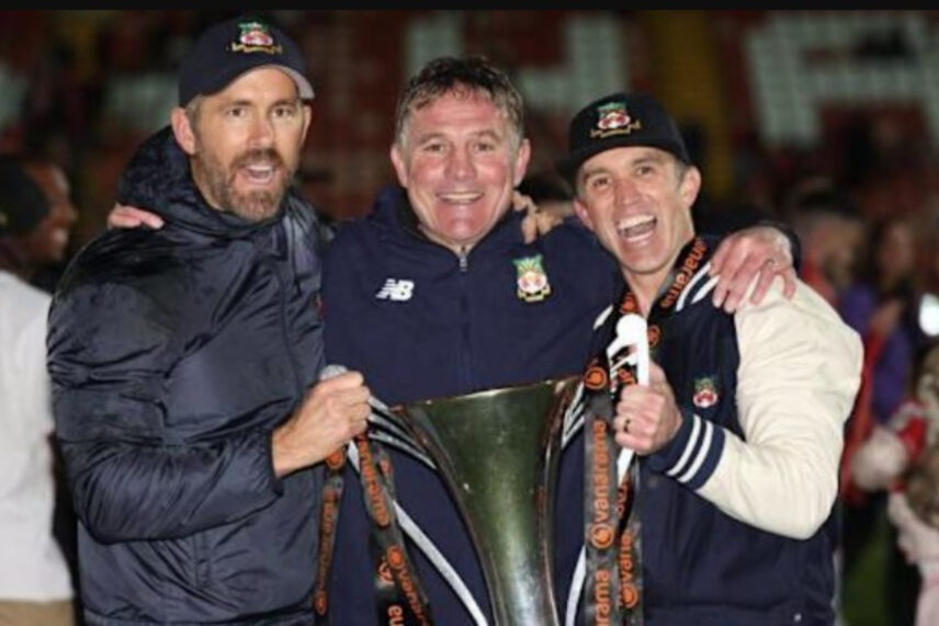 happy men with trophy