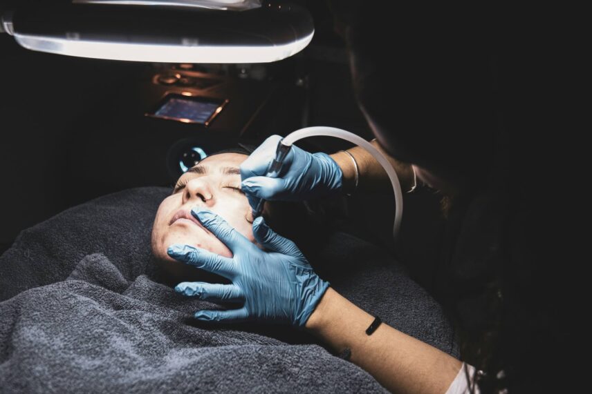 A person receiving a professional derma roller treatment