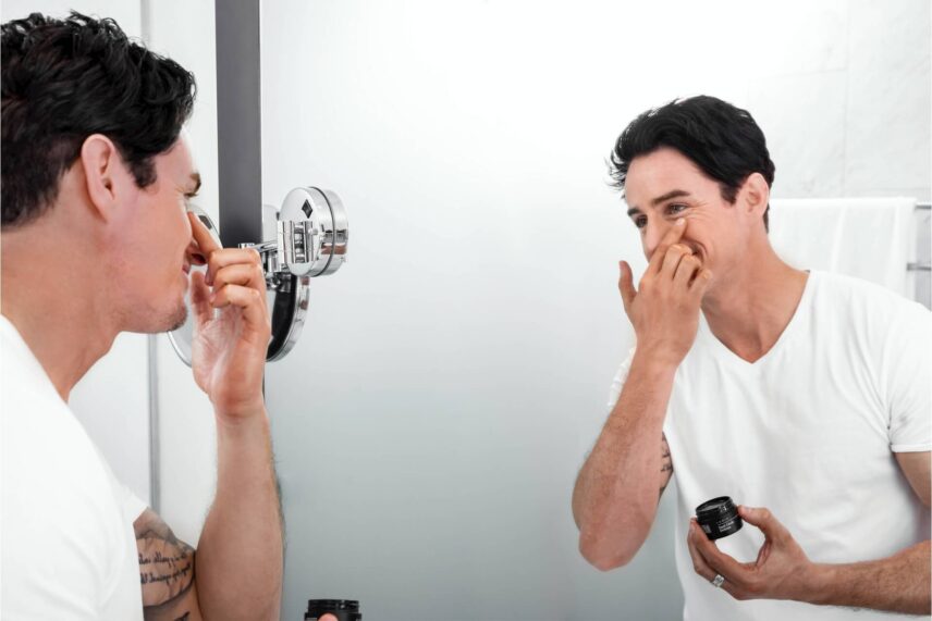 A man applying skincare