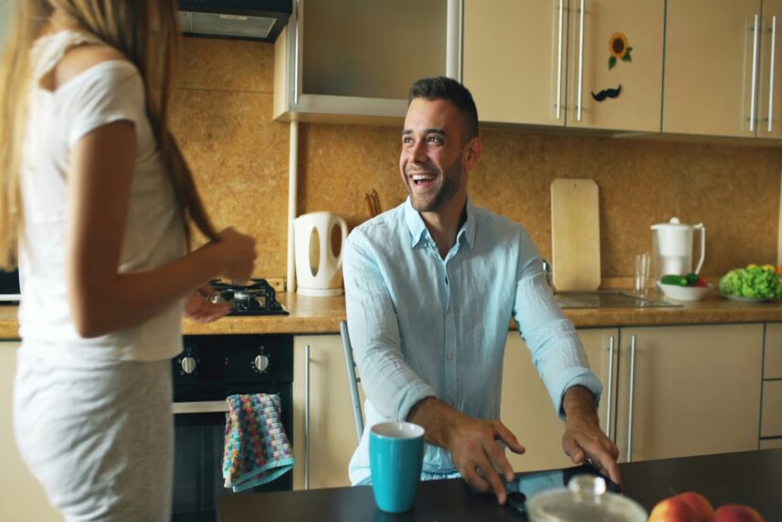 man smiling at a woman