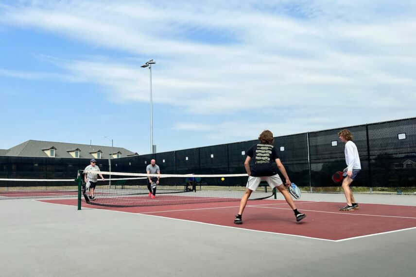 men playing pickleball