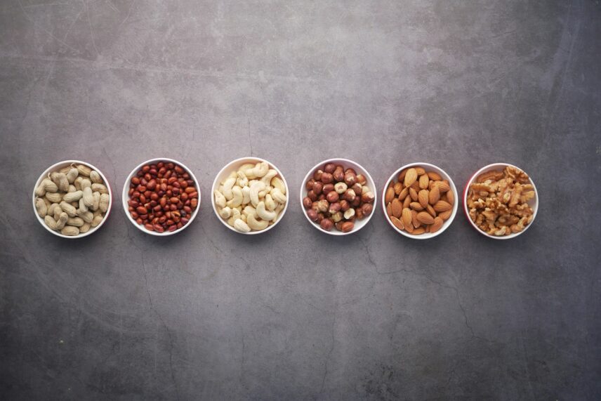 various nuts in plates