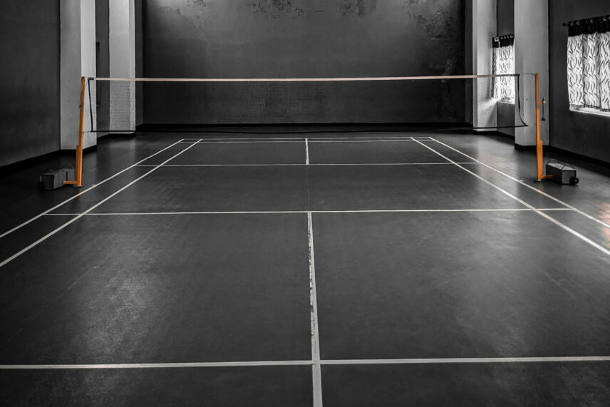 an empty badminton court