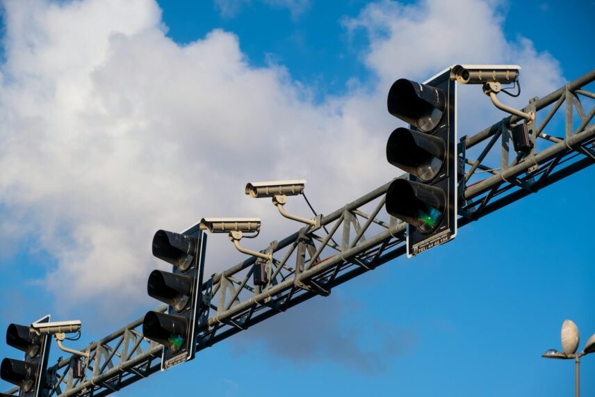A traffic light against a blue sky during daytime