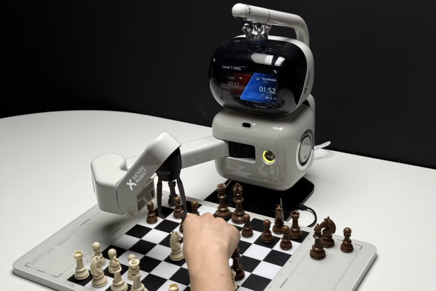 robot playing chess with a human