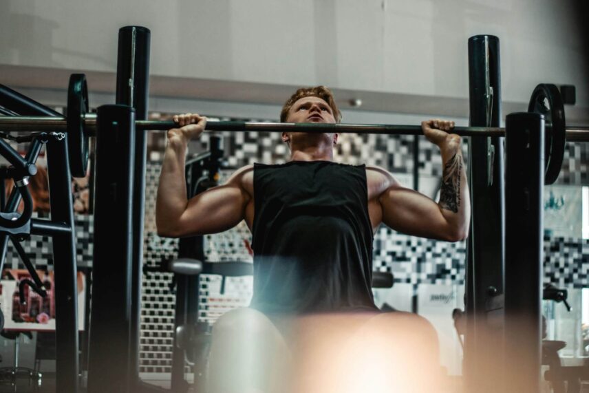 Man lifting a barbell in the gym