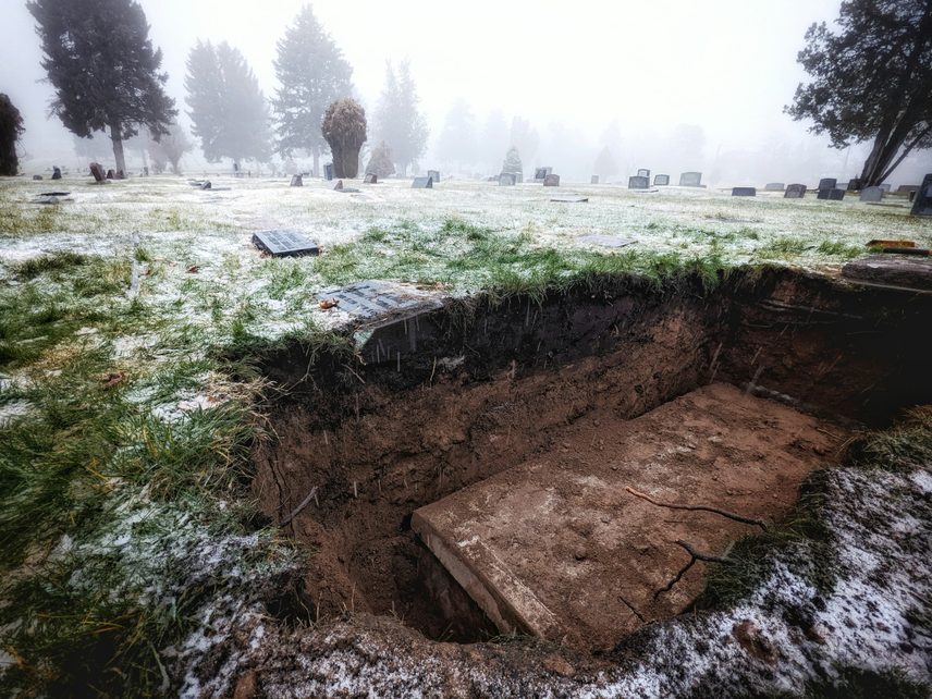Grave digging can be hard, physical work with an emotional edge.