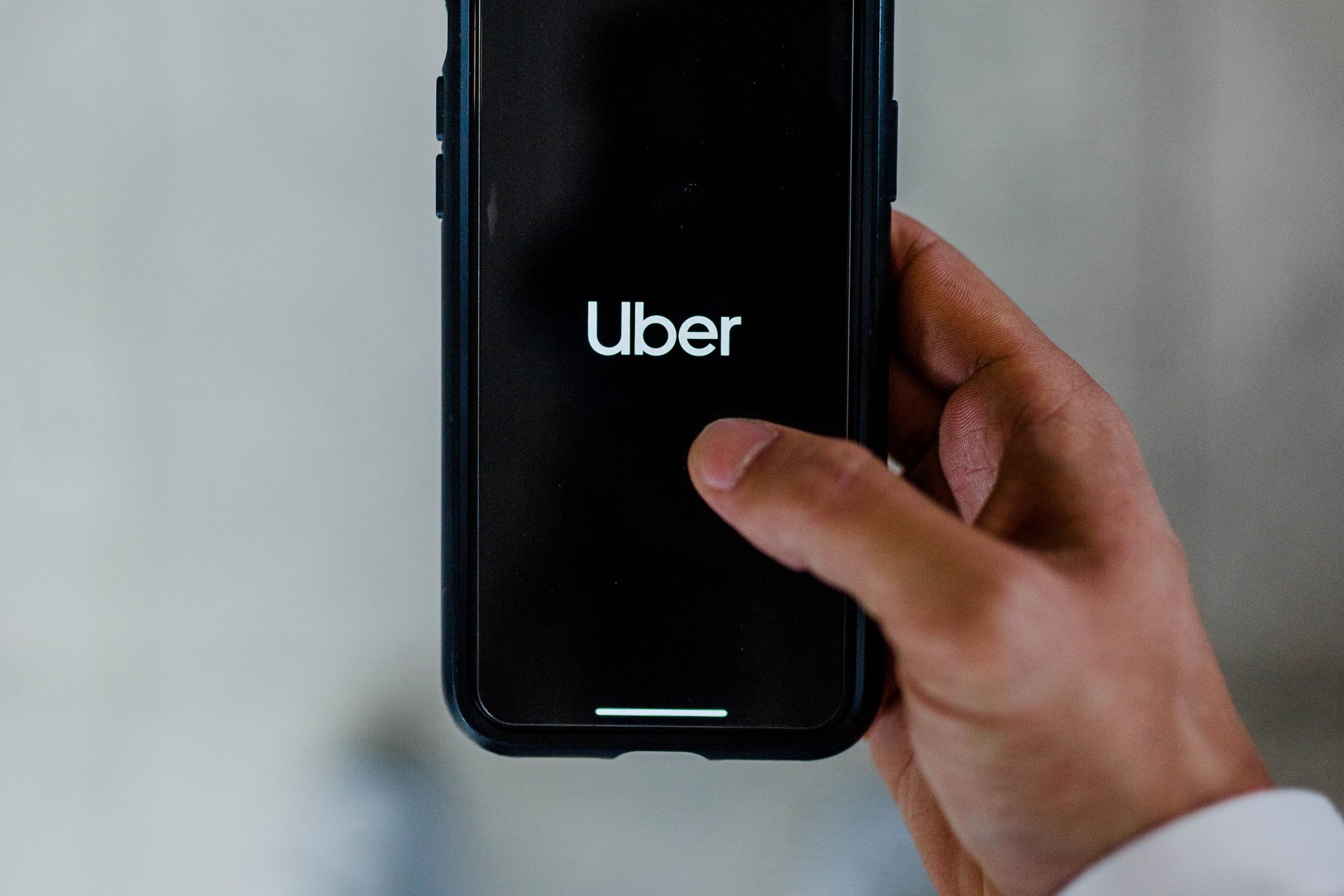 a phone featuring the Uber logo