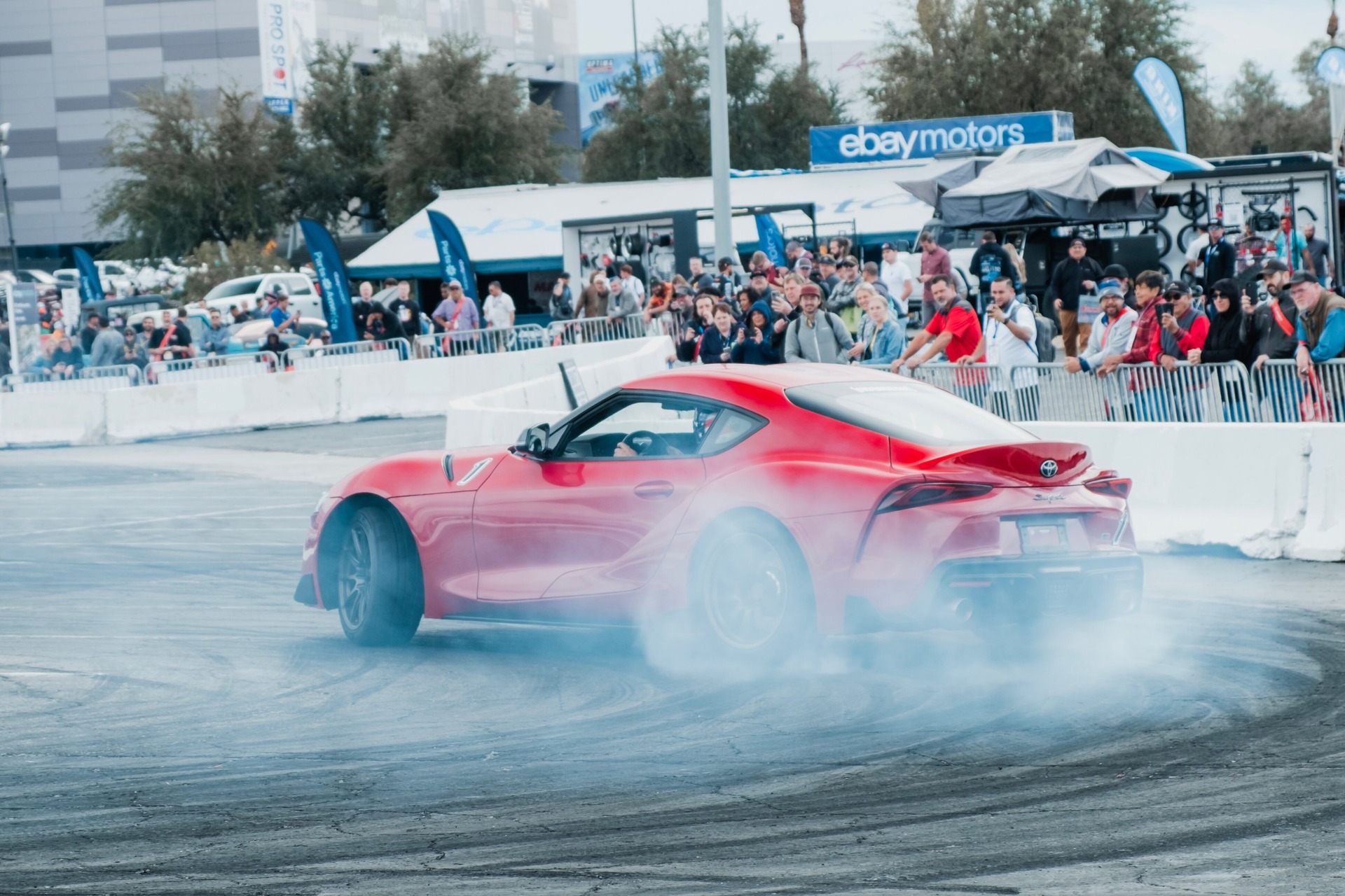 Supra drifting in the Burnout section at SEMA car show
