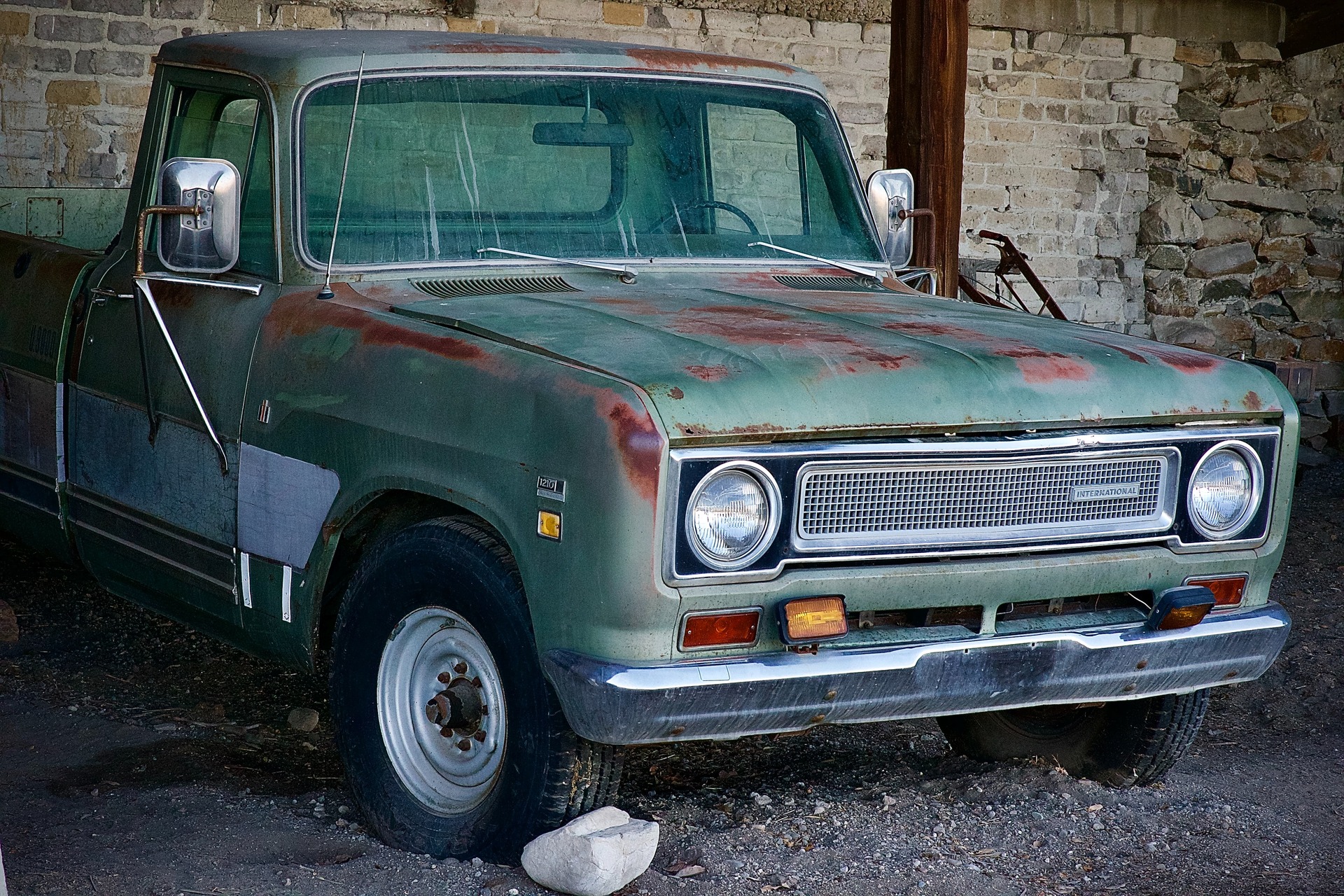 An old pickup truck in need of restoration
