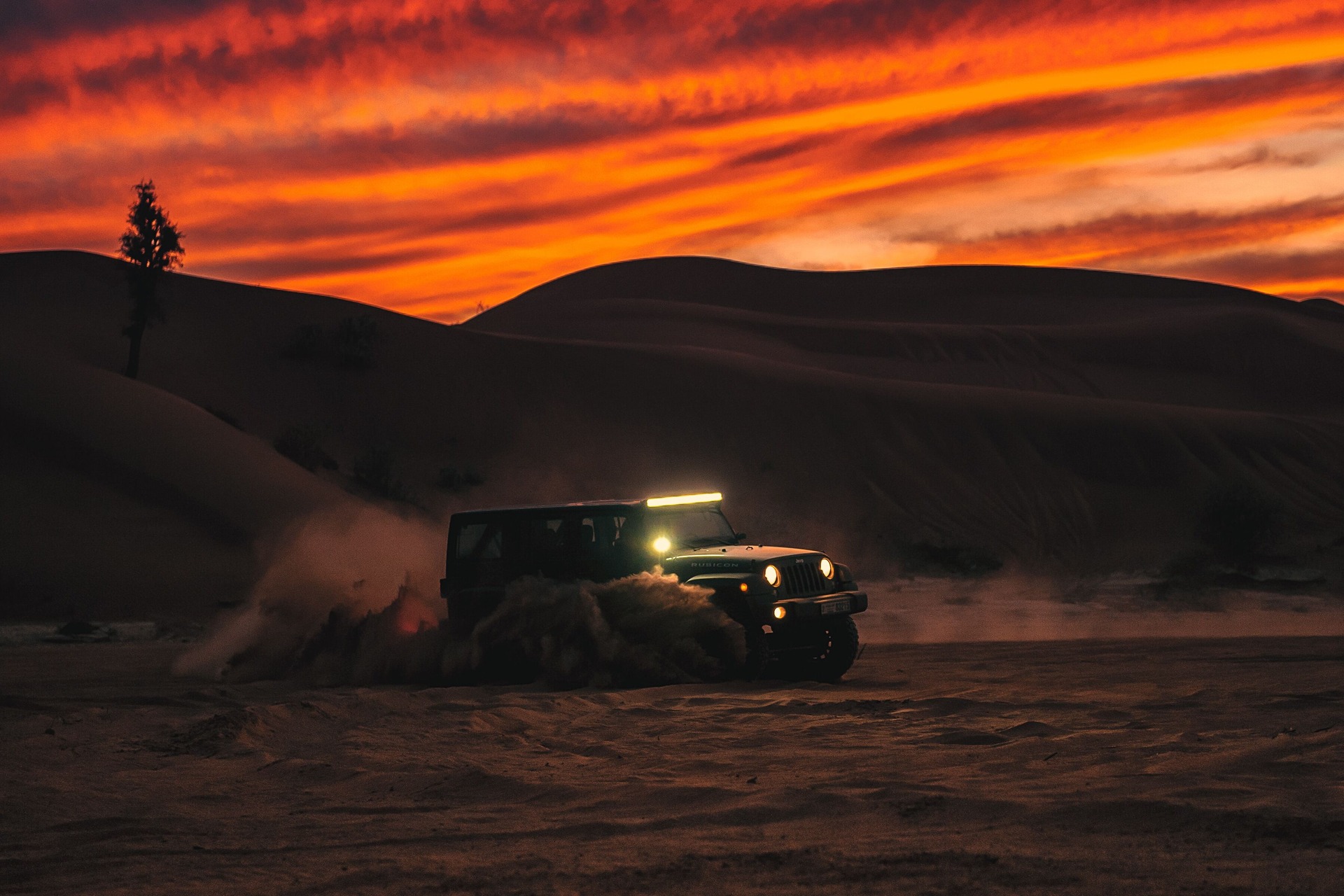 Truck off-roading at sunset
