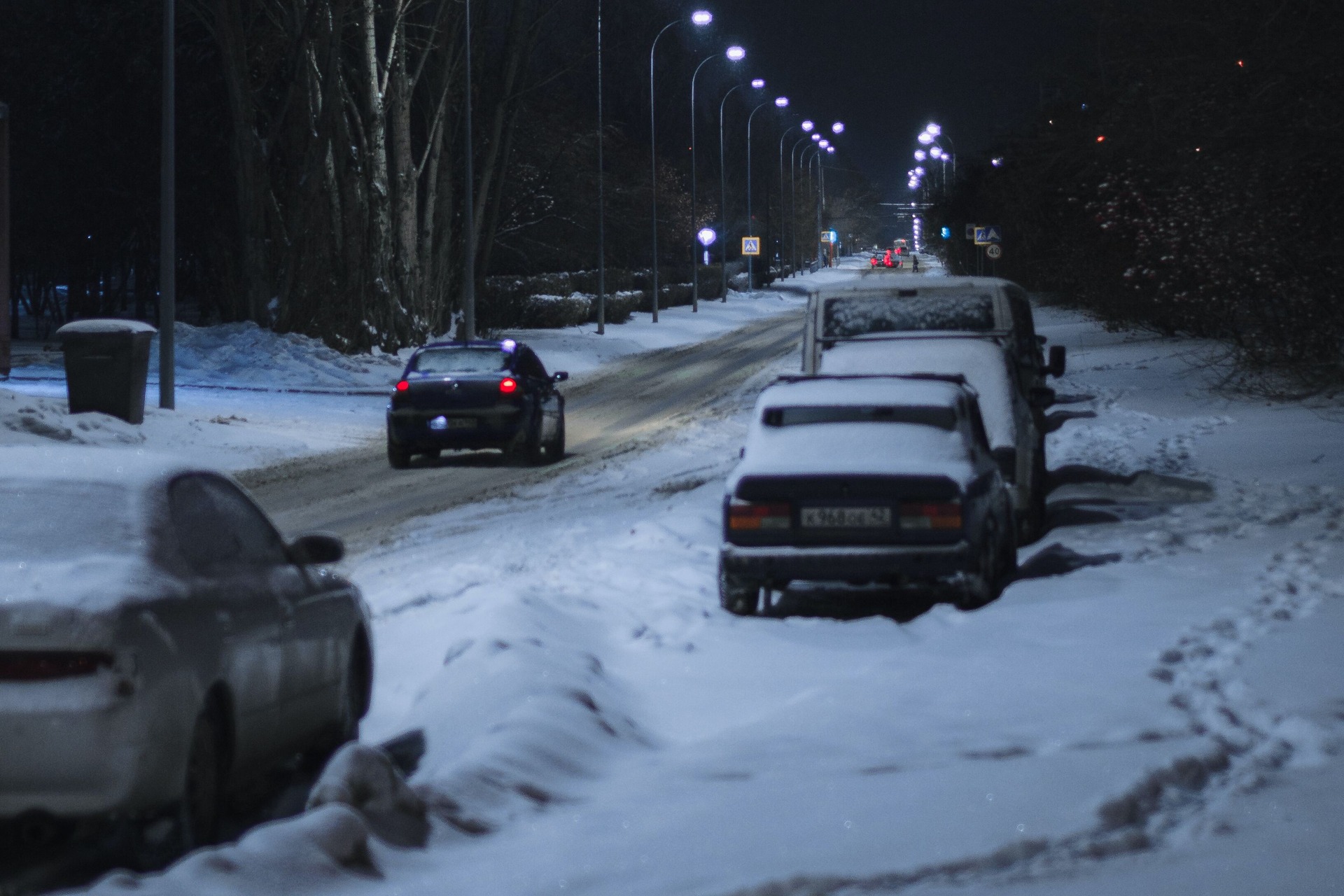 Cars driving through heavy snow