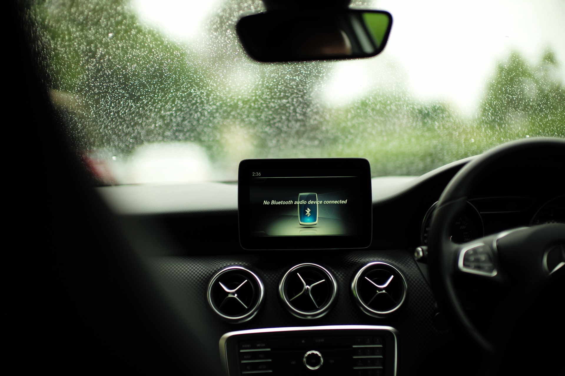 A car dashboard scanning for Bluetooth